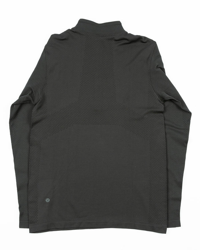 black lululemon half zip jacket with tonal Chicago Blackhawks primary logo printed on left chest - back lay flat
