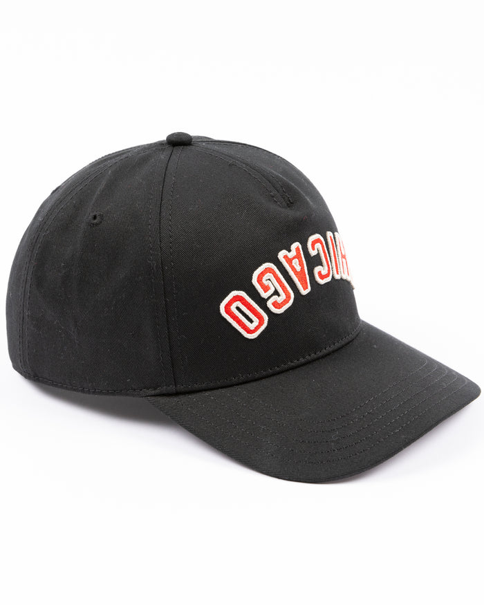 black American Needle adjustable Roscoe hat with upside down Chicago wordmark embroidered on front and Chicago Blackhawks primary logo embroidered on left side - right angle lay flat