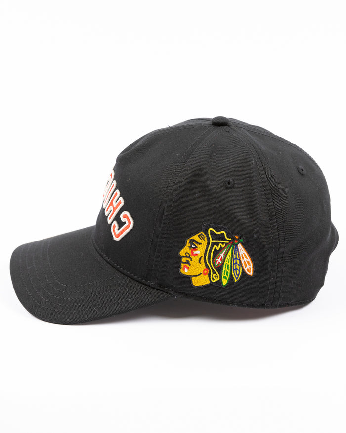 black American Needle adjustable Roscoe hat with upside down Chicago wordmark embroidered on front and Chicago Blackhawks primary logo embroidered on left side - left side lay flat