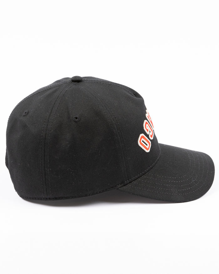 black American Needle adjustable Roscoe hat with upside down Chicago wordmark embroidered on front and Chicago Blackhawks primary logo embroidered on left side - right side lay flat