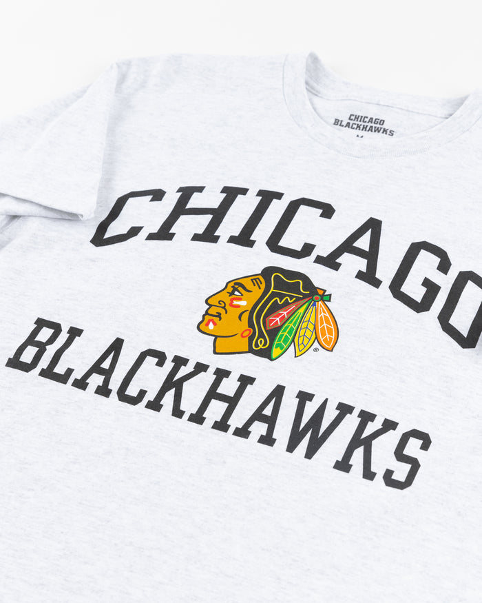 grey Chicago Blackhawks short sleeve tee with wordmark and primary logo on chest and secondary logo on left shoulder - detail front lay flat