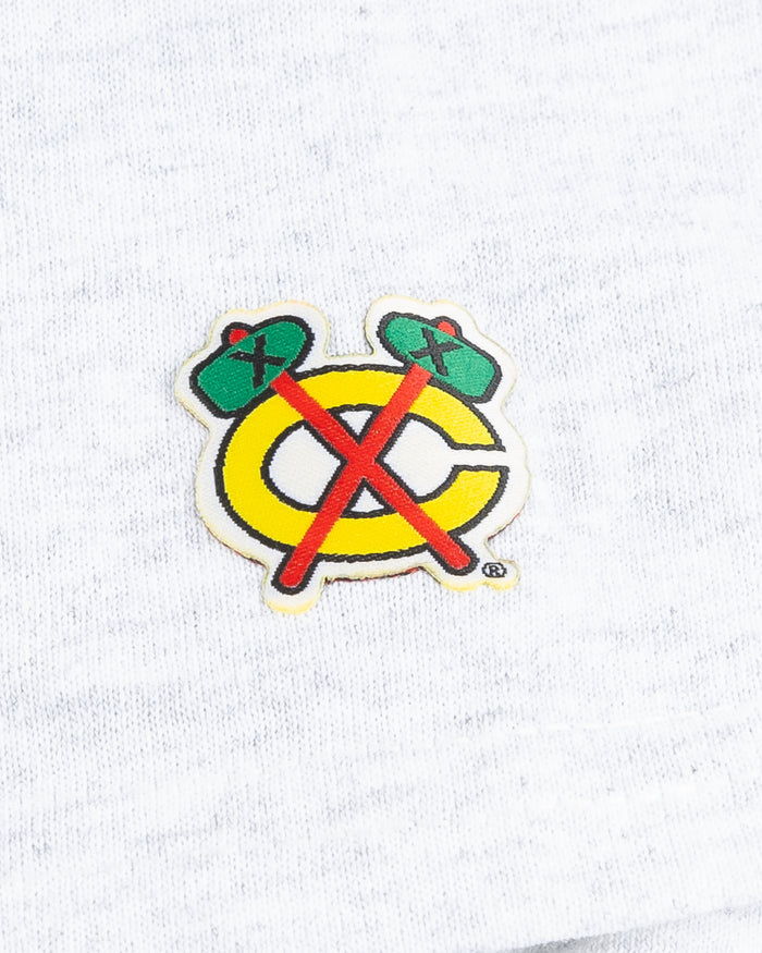 grey Chicago Blackhawks short sleeve tee with wordmark and primary logo on chest and secondary logo on left shoulder - detail shoulder  lay flat