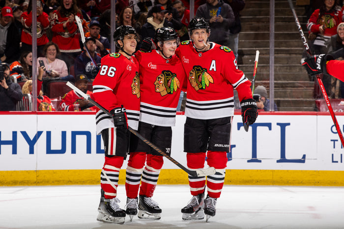 Chicago Blackhawks players Teravainen, Reichel and Murphy celebrating goal scored by Reichel against Edmonton on February 5, 2025