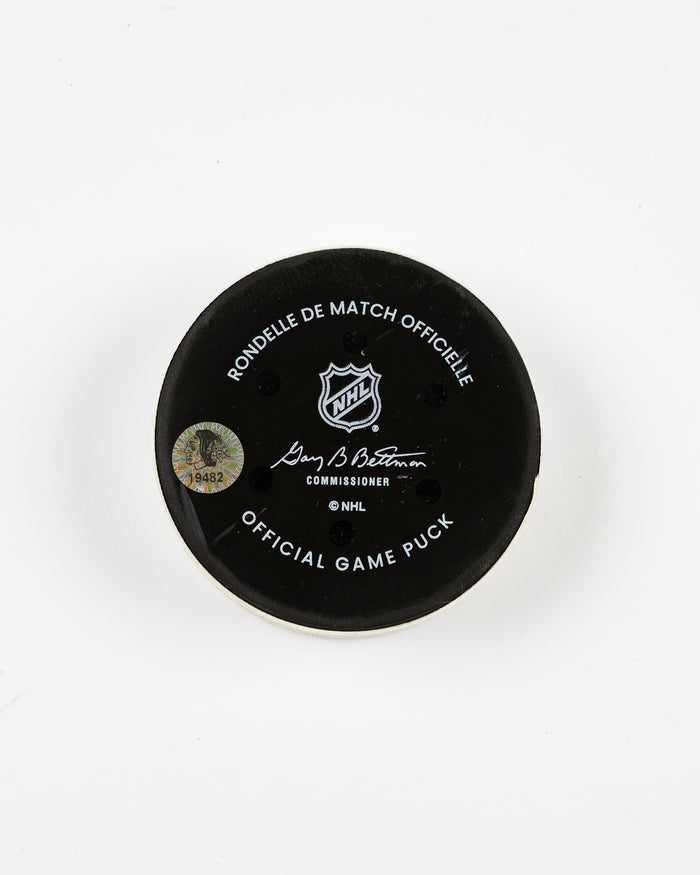 official Chicago Blackhawks game-used goal puck scored by Lukas Reichel on February 5, 2025 - back lay flat