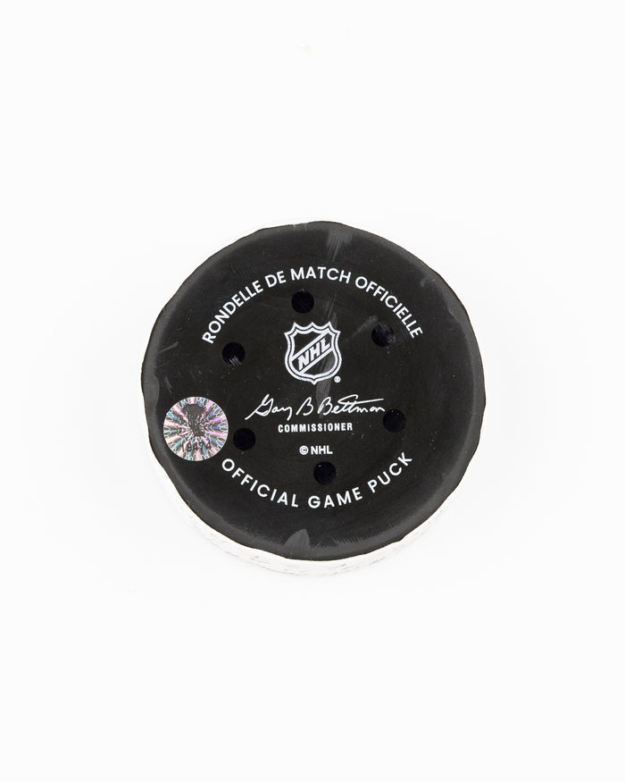 official Chicago Blackhawks game used goal puck scored by Ryan Donato against the Carolina Hurricanes on January 20, 2025 - back lay flat
